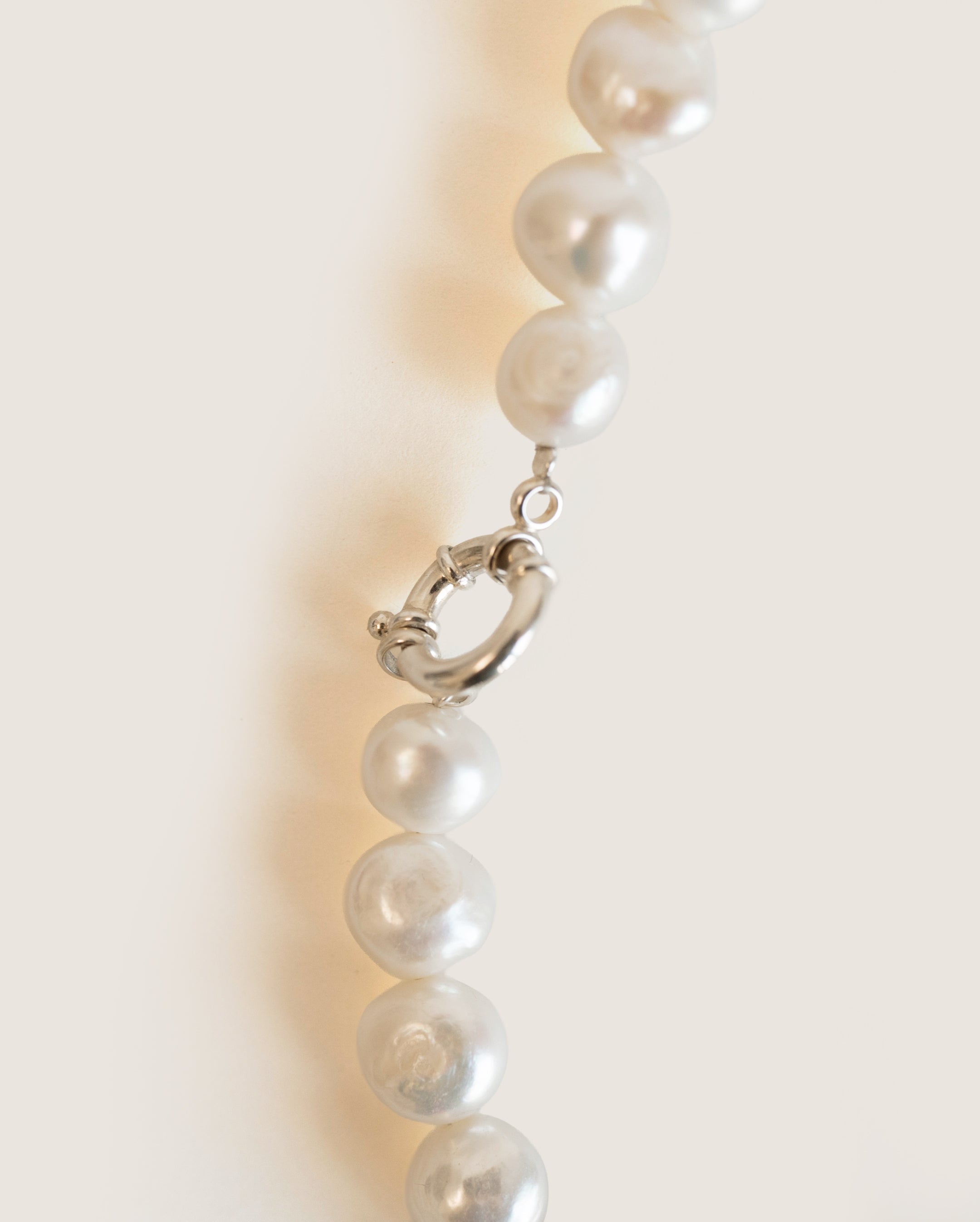 Pearl beads with silver clasp
