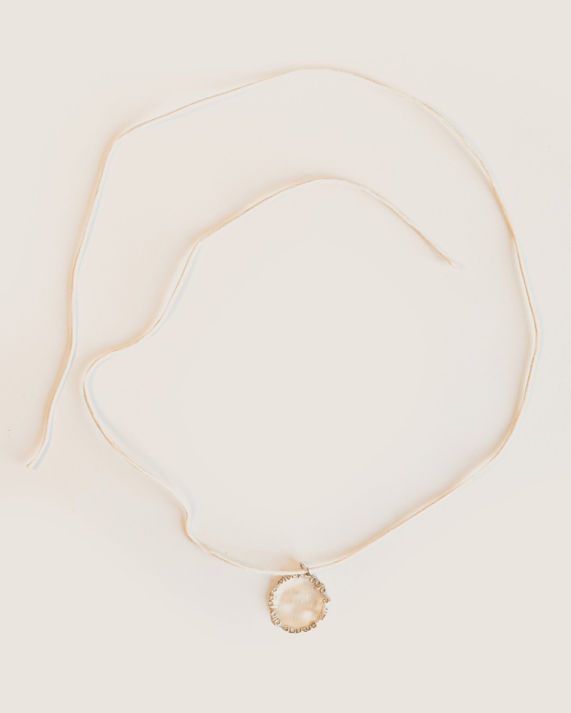 Coin Hoje pendant necklace in silver